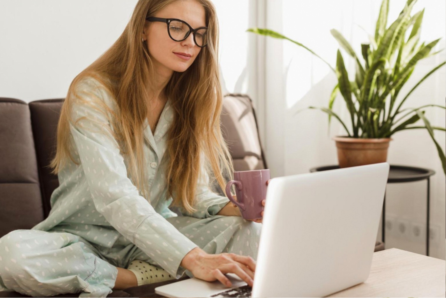Participant working through a guided flexibility routine during an online workshop session